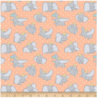 LC1967 Disney Dumbo My Little Circus Dumbo Poses On Dots Peach